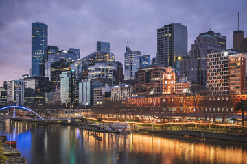 Melbourne city skyline at night along Yara River