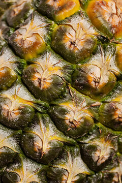 Close up macro photo of fresh pineapple pattern skin