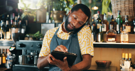 Phone call, tablet and manager with black man in restaurant for product inventory, supplier contact or budget discussion. Menu discount, bar and small business owner with employee in coffee shop