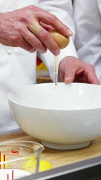 Cook gourmet is brooking eggs