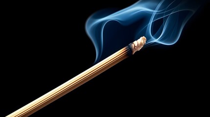 Fototapeta premium Burning Matchstick with Wisps of Smoke in Dark Background