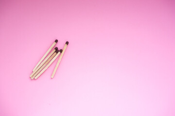 Matches on a pink background. The background for the holiday of the day of the match. There is a space for the text.