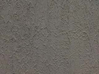 An old gray wall with a texture. Grey background. Concrete texture.