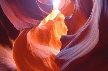 beautiful rock formations in Antelope Canyon, Arizona. The orange and pink rocks create stunning patterns as they curve upwards towards the sky. 