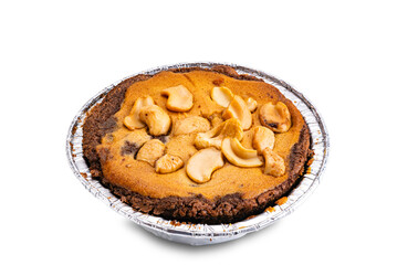 High angle view of nut chocolate cake in foil baking cup isolated on white background with clipping path.