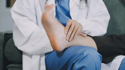 Gloved doctor examines patient's skin on leg between toes. Skin fungus on the feet concept