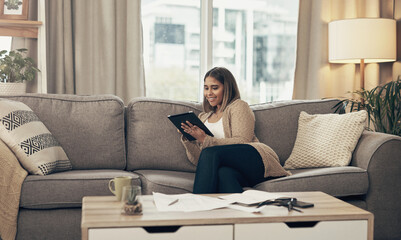 Woman, relax and research with tablet on sofa for financial planning, mortgage insurance or life...