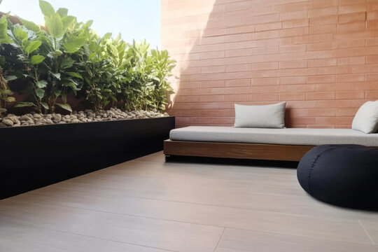 Relaxing outdoor space with comfortable seating and green plants in a serene environment