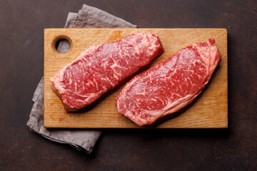 Raw marbled striploin steak, fresh, rich, ready for cooking