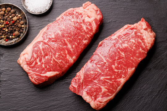 Raw marbled striploin steak, fresh, rich, ready for cooking