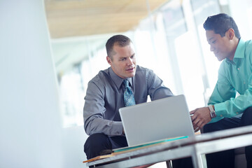 Obraz premium Men, laptop and project meeting for human resources in office, policy briefing and company introduction. Online, discussion and collaboration with onboarding recruitment process, support and teamwork