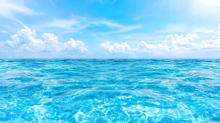 Calm ocean, blue sky, fluffy clouds; idyllic summer scene; travel brochure
