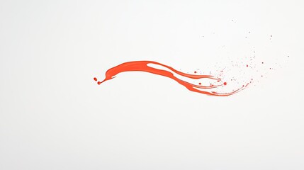 Abstract splash of red paint on a white background, creating a dynamic and artistic effect