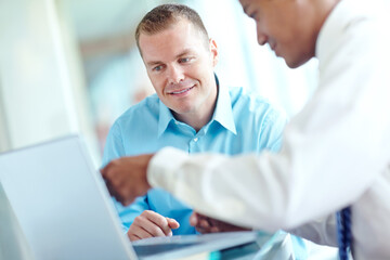 Obraz premium Men, laptop and team communication for human resources in office, policy briefing and company introduction. Online, discussion and collaboration with onboarding recruitment process, help and advice