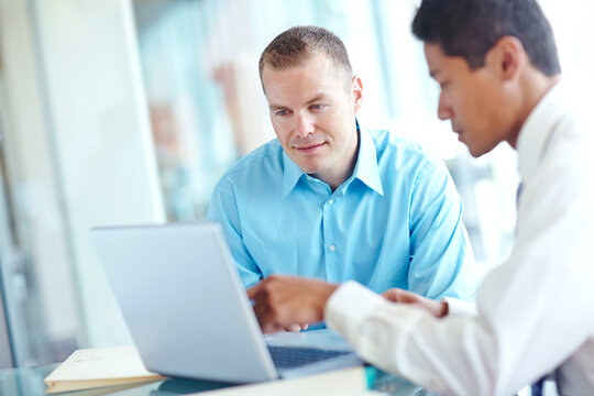Men, laptop and meeting for human resources review in office, monitor applications and resume. Online, discussion and collaboration with onboarding recruitment process, support and hiring candidates