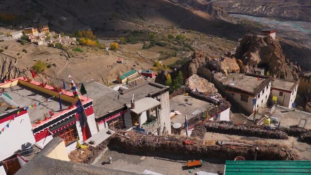 View of the roof of the buildings as seen from top of the Dhankar Gompa near Kaza in Spiti Valley, Himachal Pradesh, India. Scenic village view in the Himalayas. Ancient monastery in India.