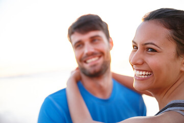 Obraz premium Love, hug and smile with couple at beach for valentines day trip, sunset and romance. Summer vacation, bonding and holiday with man and woman in Seychelles for adventure, honeymoon and travel date