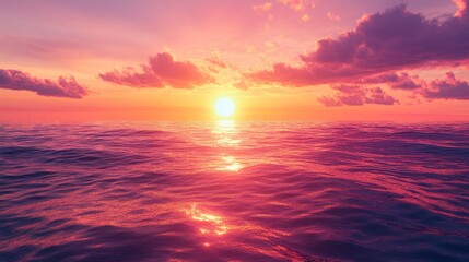Fototapeta premium A vibrant summer sunset with hues of orange, pink, and purple reflecting off the calm ocean waves