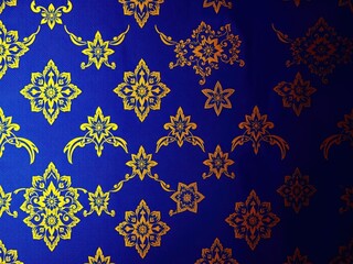 Blue and Gold Floral Pattern Textile Design