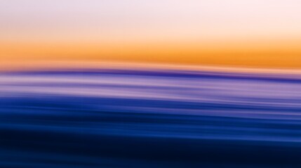 Obraz premium Breathtaking seascape with a mesmerizing display of vibrant color gradients smooth motion and a tranquil surreal atmosphere The image captures the serene beauty of the ocean at dusk or dawn