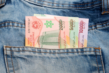 Central African CFA franc  in the pocket of blue jeans