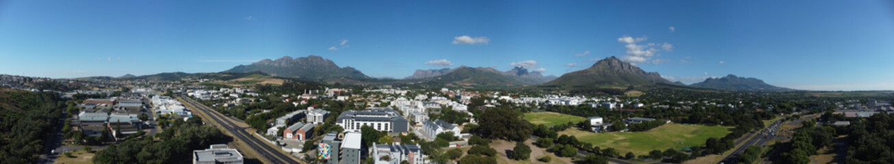 Obraz premium Stellenbosch Town South Africa Aerial Panorama with mountains in the background.