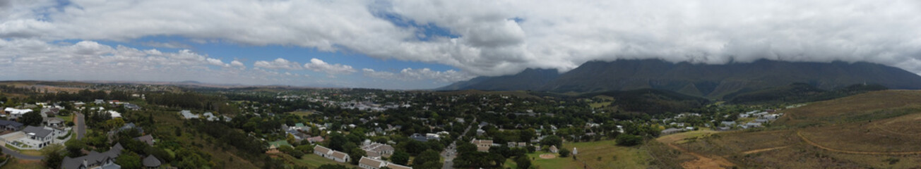 Swellendam Town South Africa Aerial Panorama with mountains in the background.