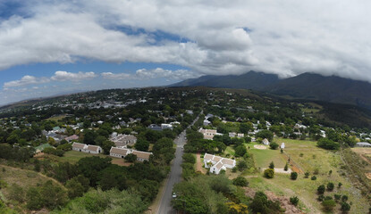 Fototapeta premium Swellendam Town South Africa Aerial Panorama with mountains in the background.