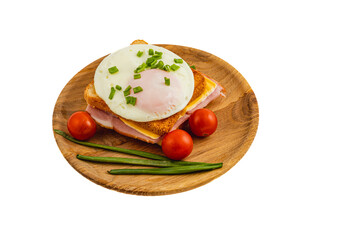 Delicious breakfast plate featuring ham, egg, and cherry tomatoes