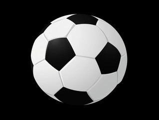 Fototapeta premium A classic black and white soccer ball isolated on a black background.