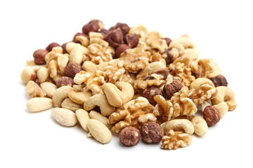 A nutritious mix of walnuts, cashews, almonds, and hazelnuts on a white surface. Perfect for healthy snacking, cooking, or trail mix blends