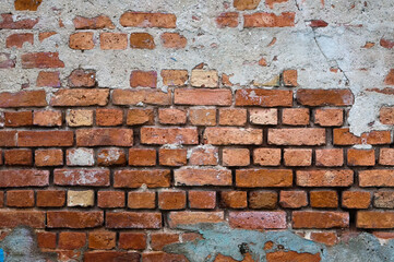 brick wall, in the photo the texture of the old brick wall and plaster