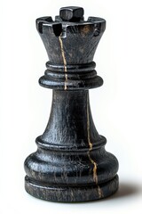 Carved ebony rook chess piece with sharp lines and deep black finish on white background