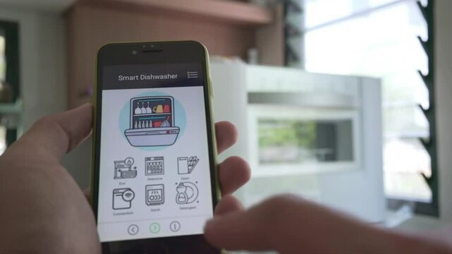 A smart phone is being held up to a smart home device. The phone is displaying a list of options for the user to choose from