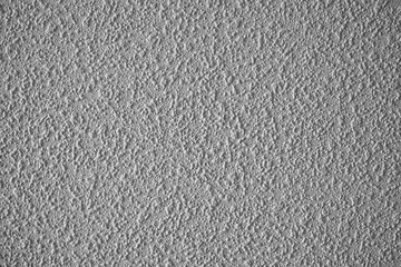 Textured wall surface with a subtle gray finish adds depth and character