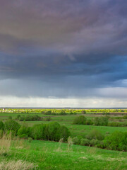Cloudy sky with a storm brewing in the distance