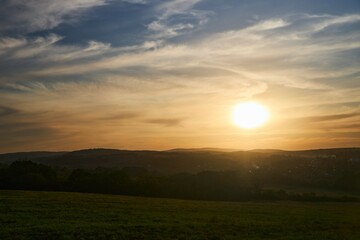 Sunset on a natural landscape. Beautiful clouds