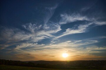 Sunset on a natural landscape. Beautiful clouds