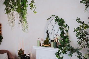 Elegant indoor decor with greenery and natural elements in a cozy setting