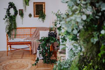 Cozy indoor space adorned with plants and artisanal decor elements