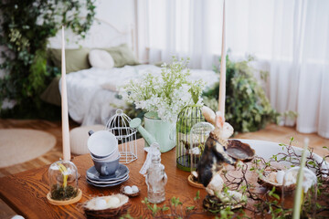Beautiful spring tabletop arrangement in a cozy decor setting