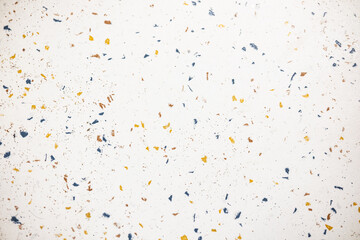 Modern terrazzo flooring with colorful speckles in bright setting