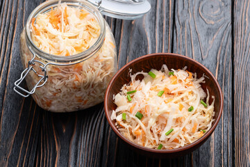Tasty marinated cabbage with carrot, healthy food  Sauerkraut photography . Top view