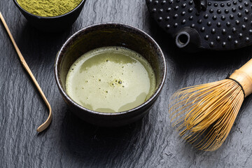 Japanese ceremony . Green powder tea matcha , healthy drink . Top view