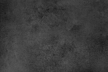 Textured black surface showcasing depth and subtle variations in tone