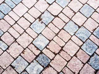 brown and gray stone tiled road paving