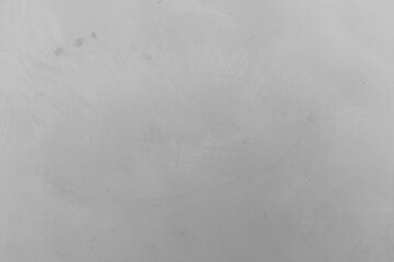 Gray surface with subtle texture and scratches in a minimalistic style