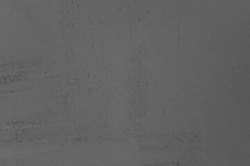 Dark textured background creates a minimalist and modern aesthetic in design