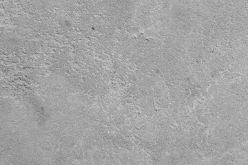 Textured gray surface with subtle patterns in a natural light setting
