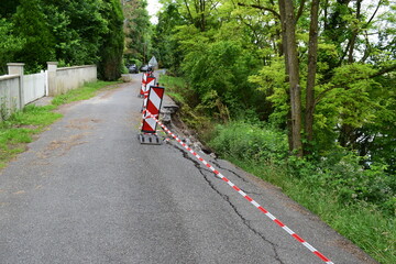 cracked roadside after the heavy rain disasters in France